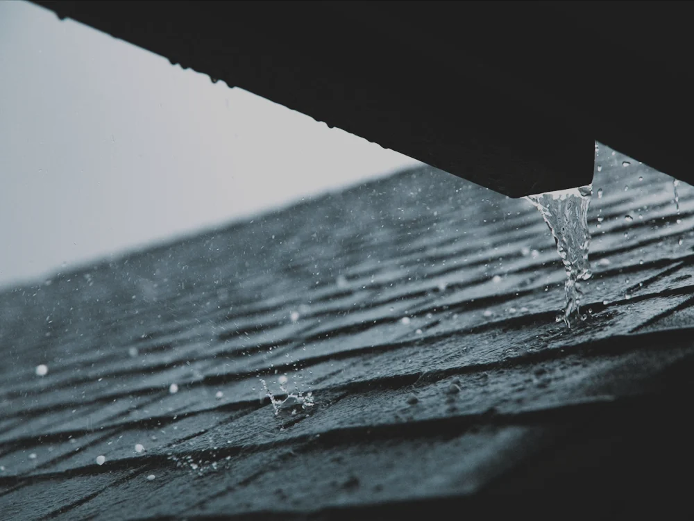 Rain gutters along a home’s roofline.